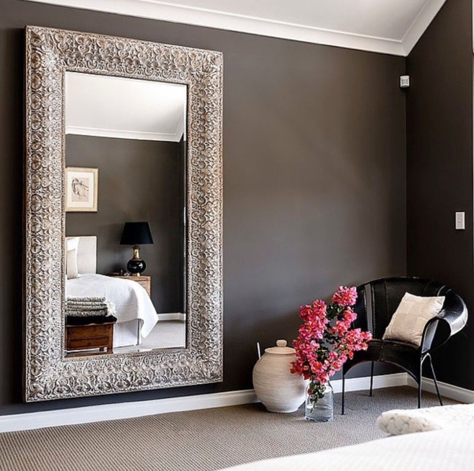Bedroom with large mirror