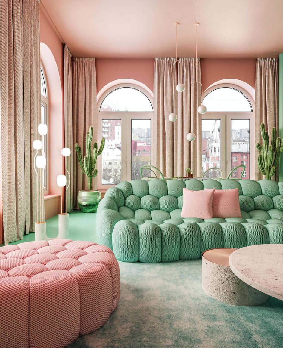 Pink sofa green walls