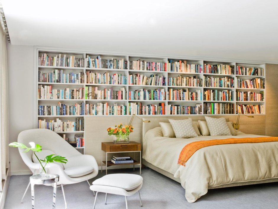 Bookshelves behind bed