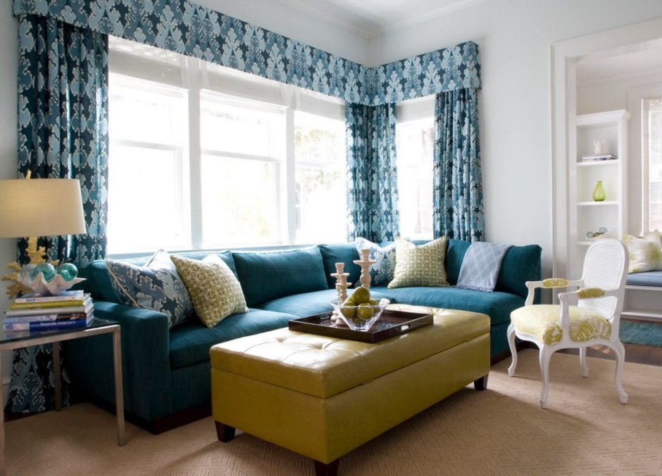 Blue sofa green curtains