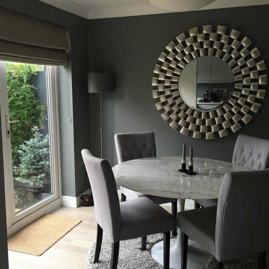 Mirror above dining table