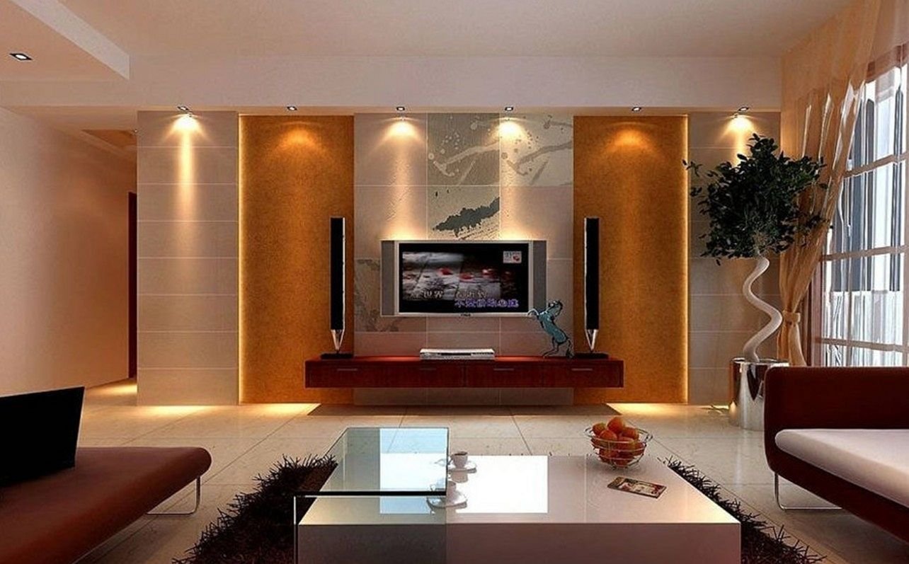 Подсветка домашнего телевизора. Современная отделка стен в гостиной. Телевизор в гостиной. Гостиная с телевизором на стене. Телевизор в интерьере.
