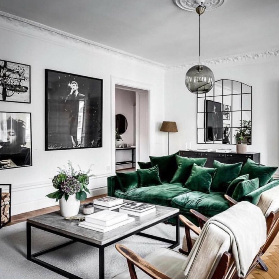 Living room in the Scandinavian style of emerald color