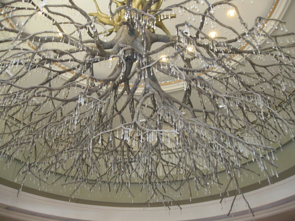 A chandelier in the shape of a tree branch