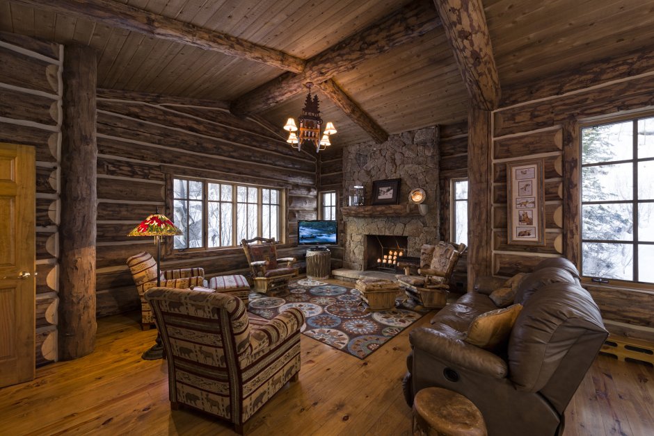Room with a FirePlace in a Wooden House