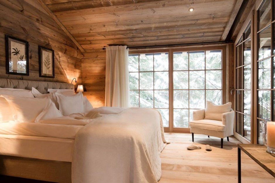 Scandinavian bedroom in a wooden house
