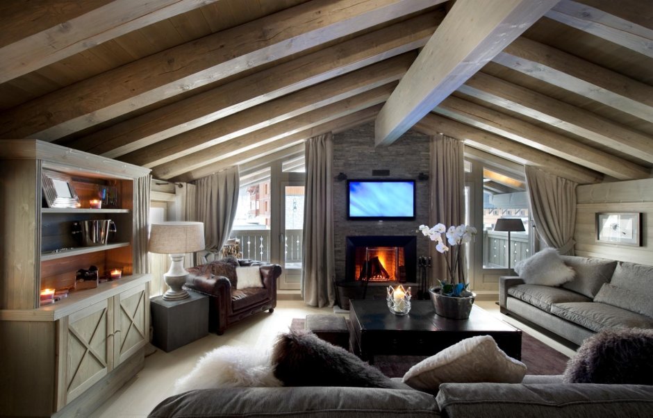 Modern fireplace in a wooden house