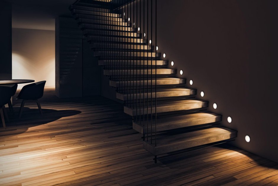 The backlighting of the railing of the stairs