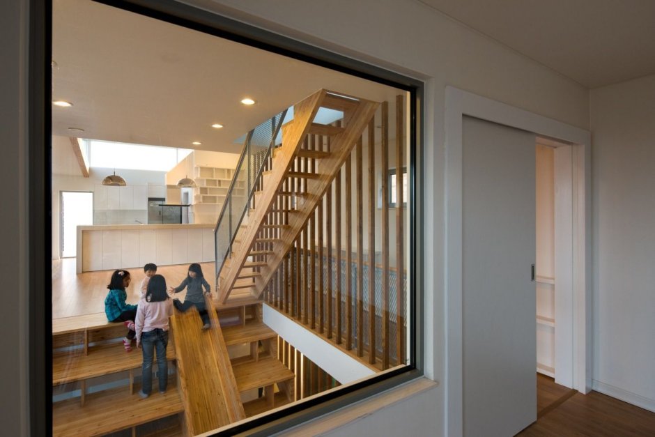 Glass partition under the stairs