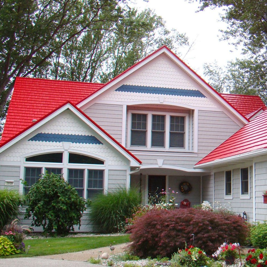 Blue house with a red roof