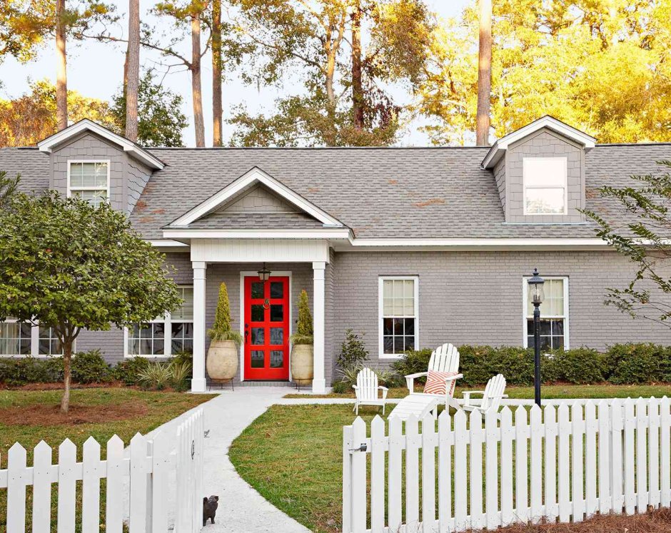 Gray house with a red door
