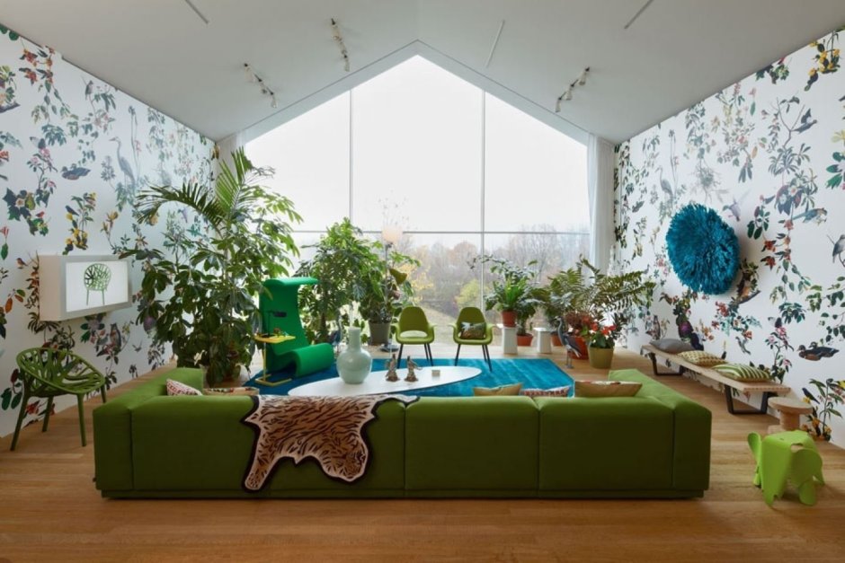 Room design with green sofa