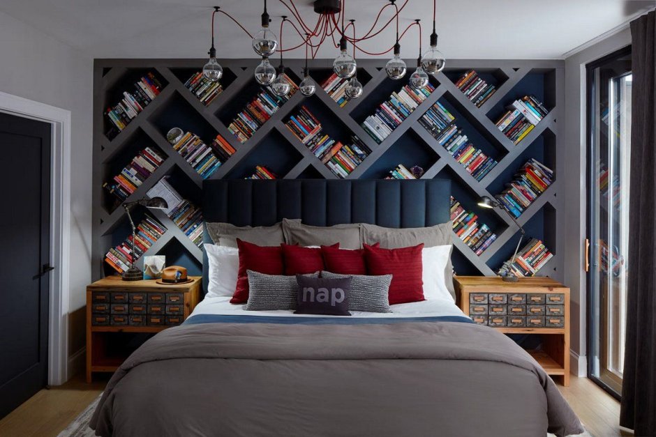Blue bedroom with bookshelves