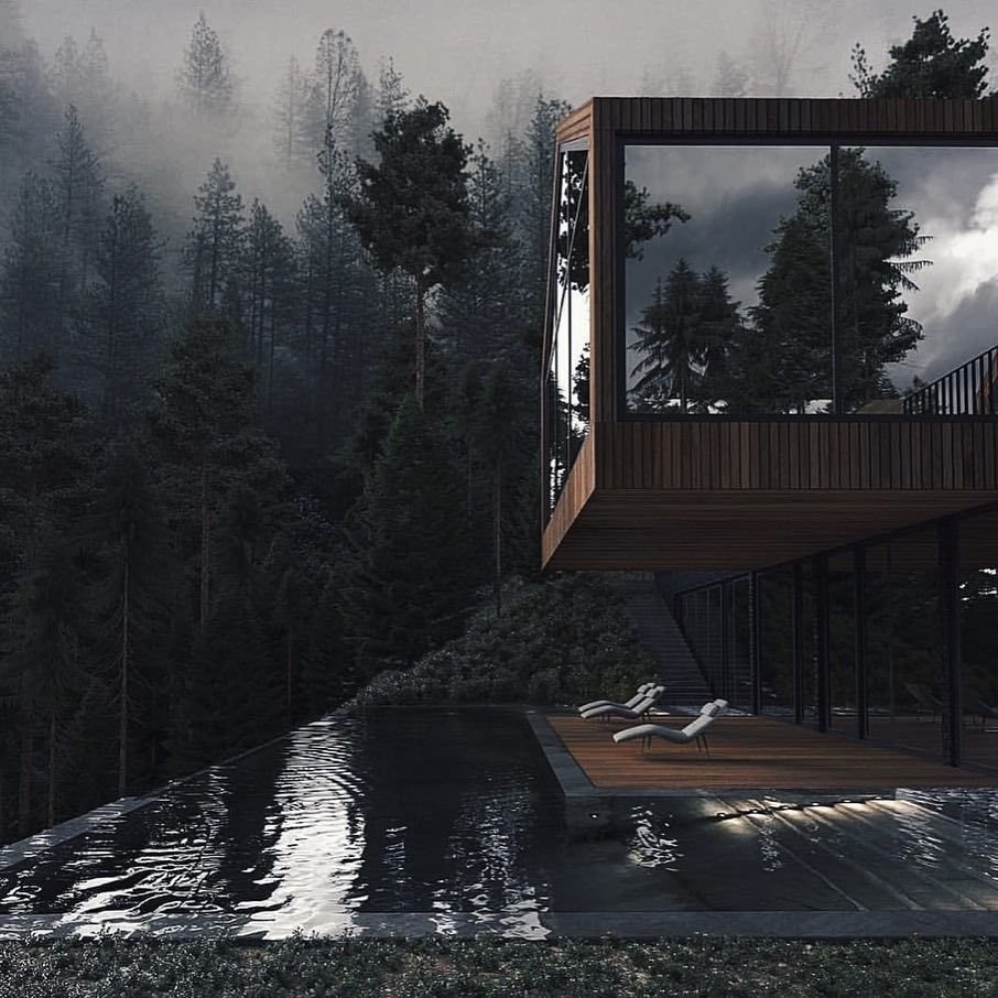 House in forest near lake