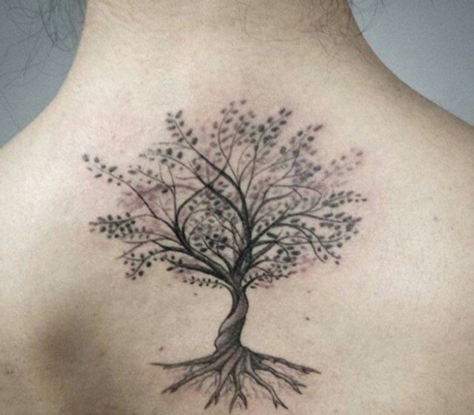 Green tree tattoo