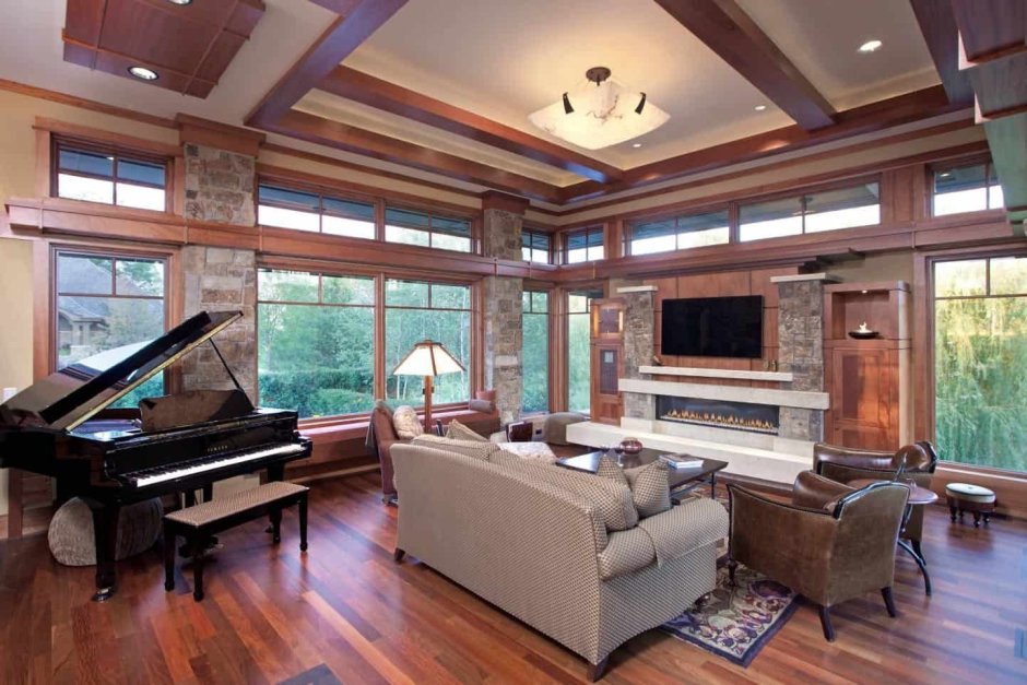 Living room with piano and fireplace