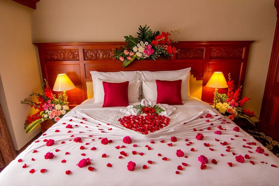 Hotel room decoration with flowers and candles