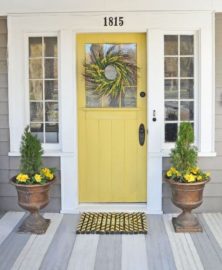Yellow house brown door