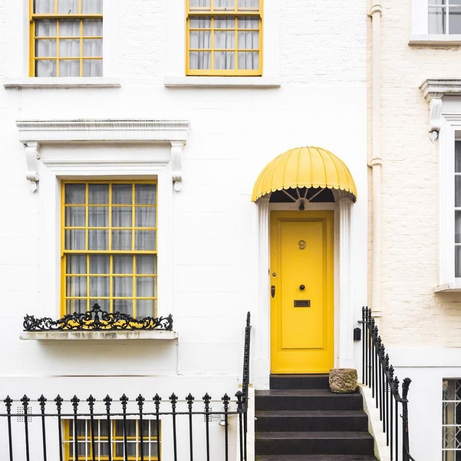 Yellow house white door